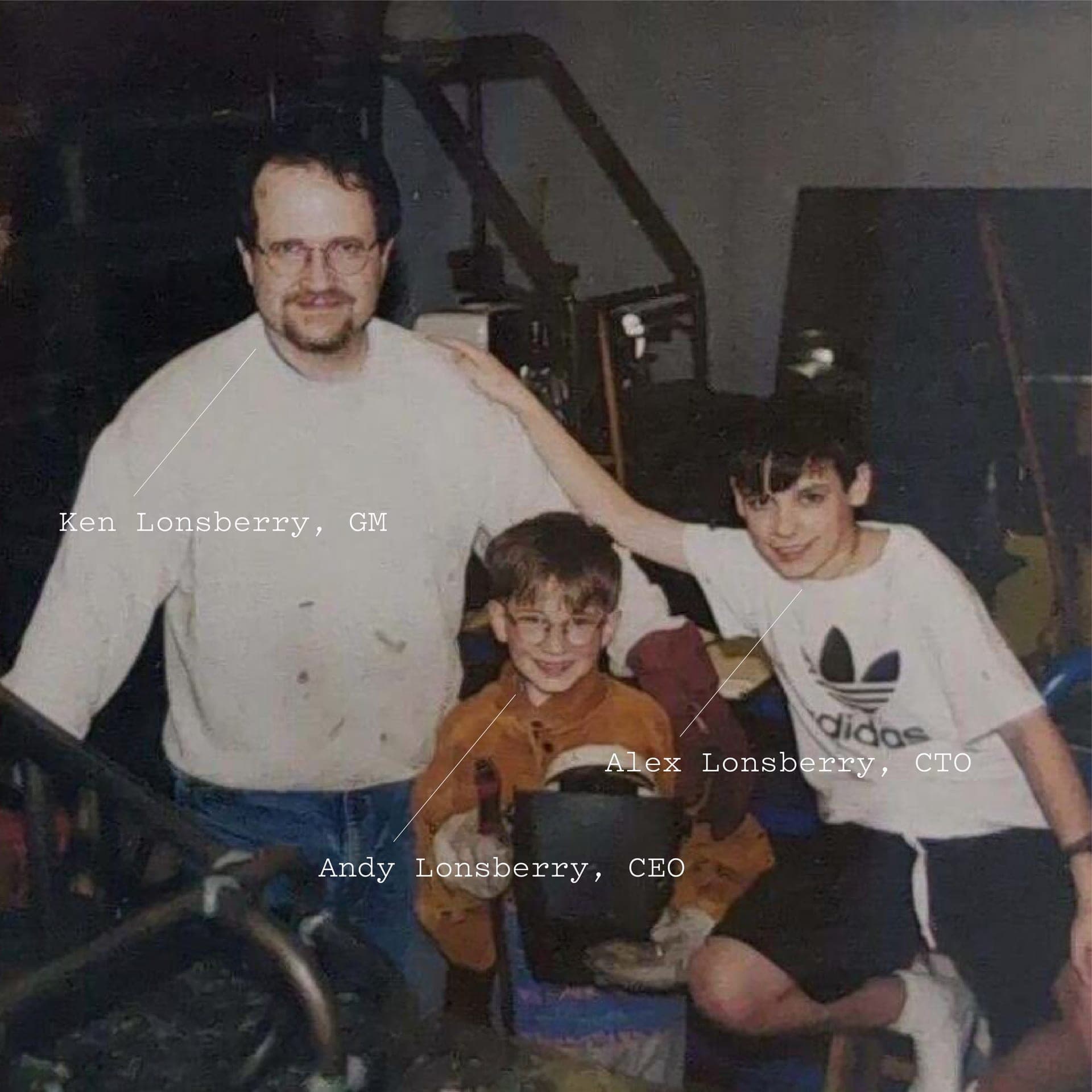 The Lonsberry family - Ken, Alex, and Andy welding in the garage